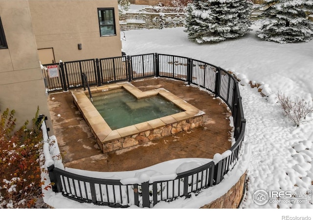 view of snow covered pool