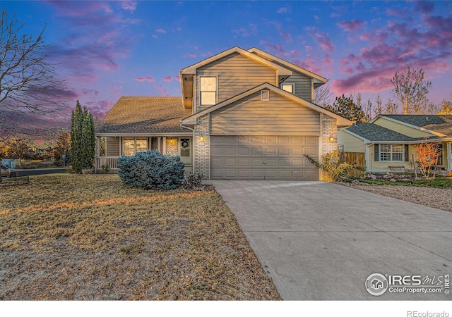 front of property with a garage