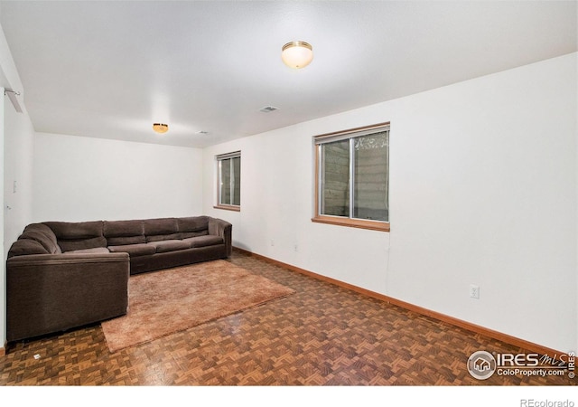 living room with dark parquet floors