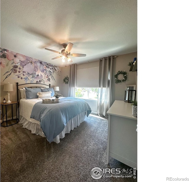 bedroom with a textured ceiling, dark colored carpet, and ceiling fan