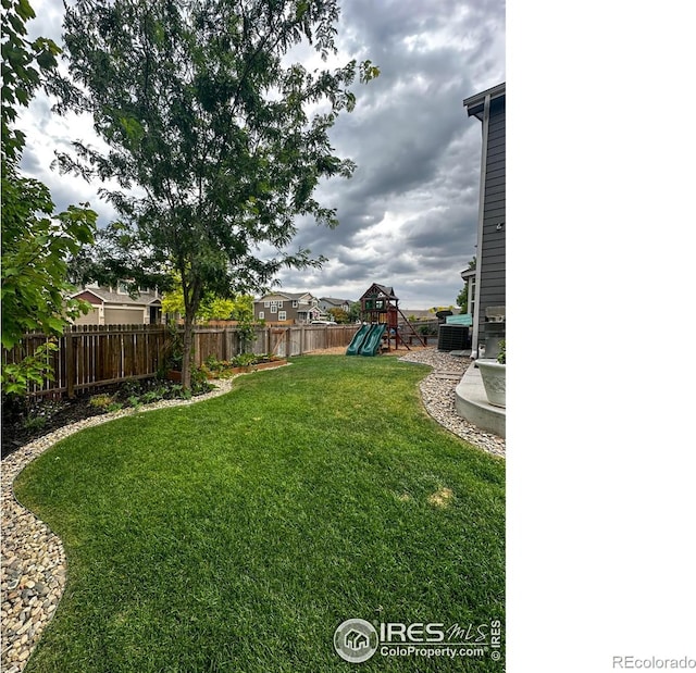 view of yard with a playground