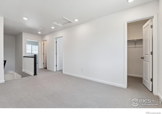 empty room featuring light colored carpet