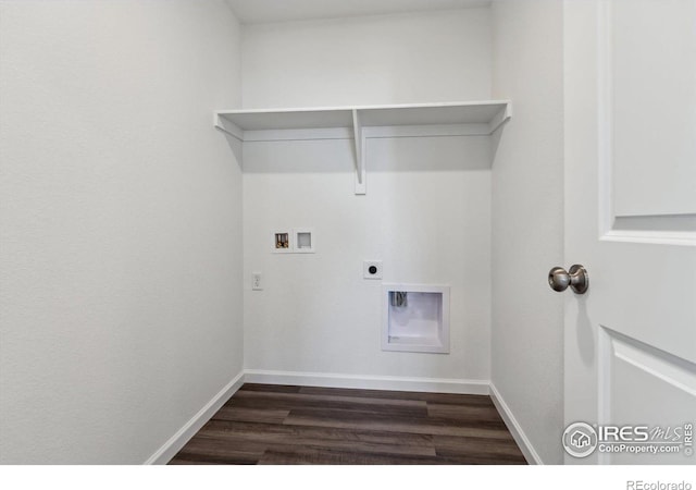 washroom featuring dark hardwood / wood-style flooring, washer hookup, and hookup for an electric dryer