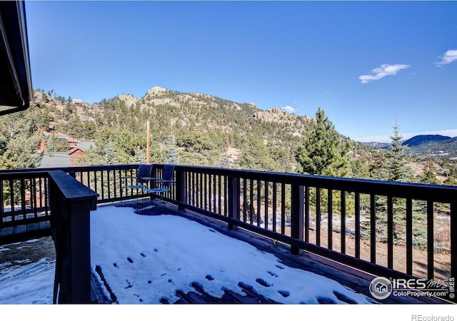 deck with a mountain view