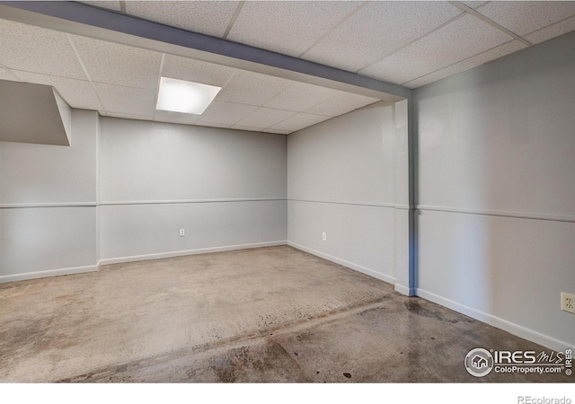 basement featuring a drop ceiling