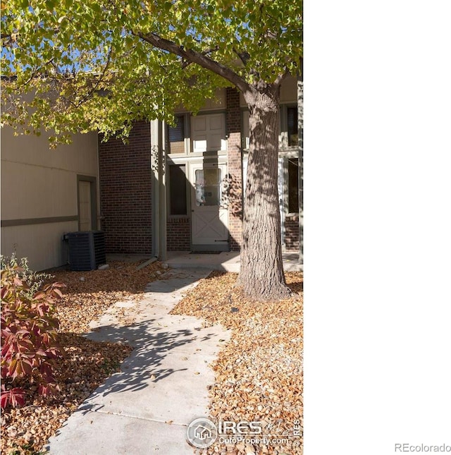 view of property exterior featuring central AC unit