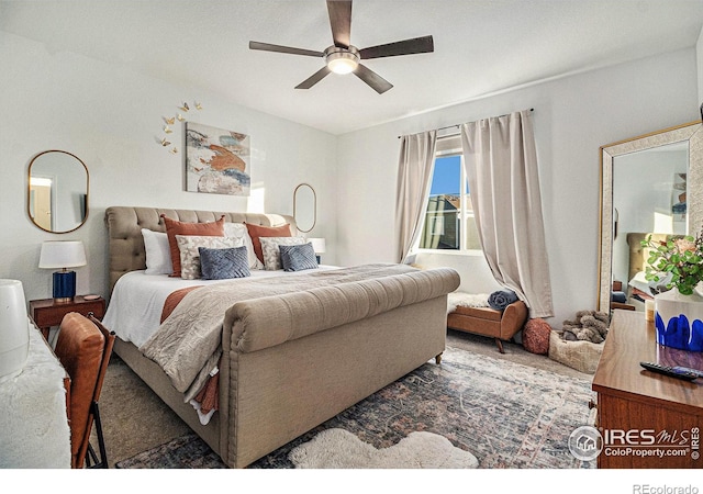 carpeted bedroom with ceiling fan