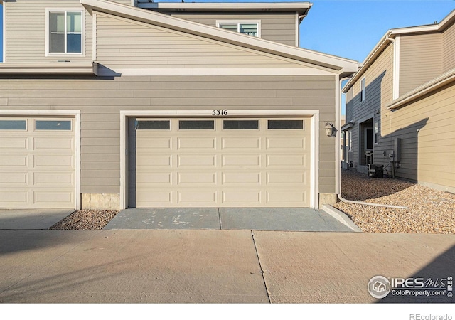 garage featuring cooling unit