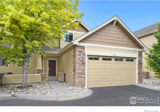 craftsman-style house featuring a garage