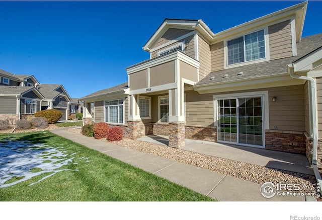 view of front of home with a balcony