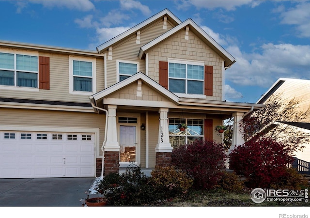 craftsman-style house with a garage