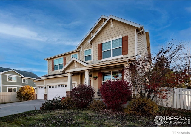 craftsman inspired home featuring a garage