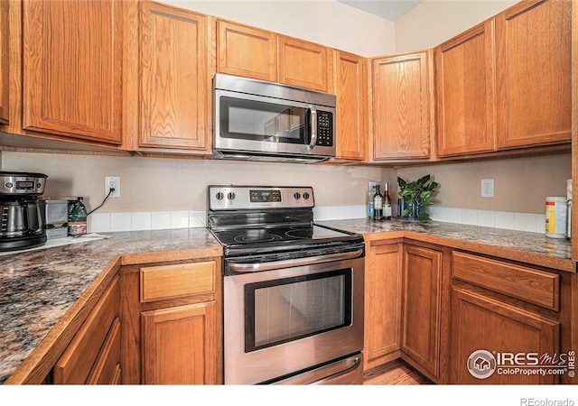 kitchen featuring appliances with stainless steel finishes