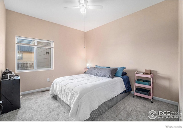 carpeted bedroom featuring ceiling fan