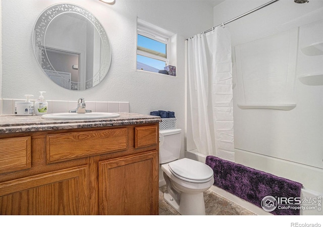 full bathroom featuring vanity, shower / bathtub combination with curtain, and toilet