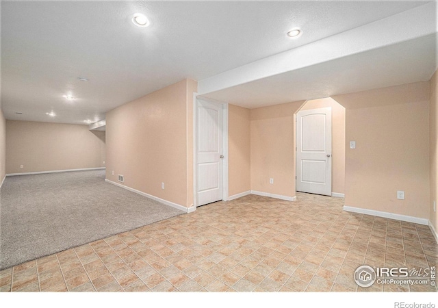 basement with light carpet