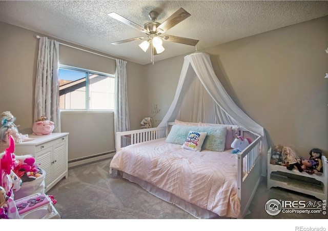 bedroom with carpet flooring, a textured ceiling, ceiling fan, and a baseboard heating unit