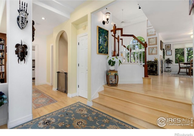 foyer entrance with light wood-type flooring