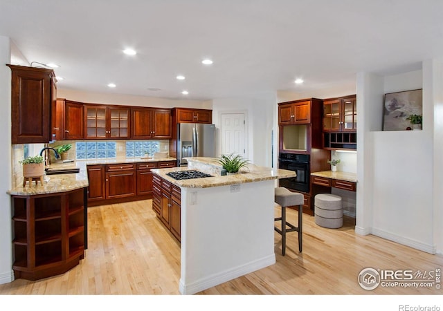 378 High Pointe Dr, Fort Collins, CO 80525 - kitchen featuring black appliances, a sink, light wood-style flooring, open shelves, and recessed lighting