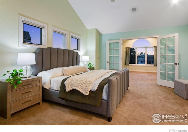 378 High Pointe Dr, Fort Collins, CO 80525 - bedroom featuring light colored carpet and vaulted ceiling
