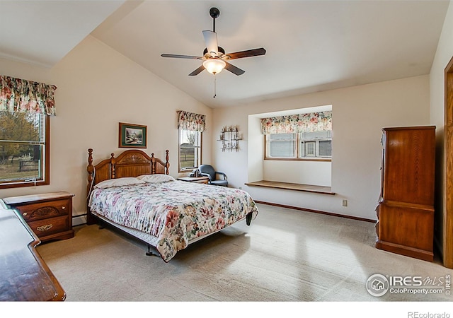 bedroom featuring light carpet, vaulted ceiling, ceiling fan, and a baseboard heating unit