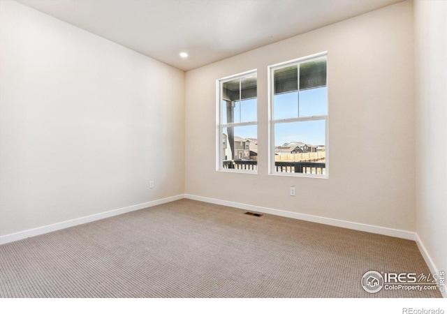 view of carpeted empty room