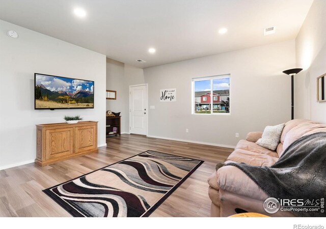 living room with light wood-type flooring