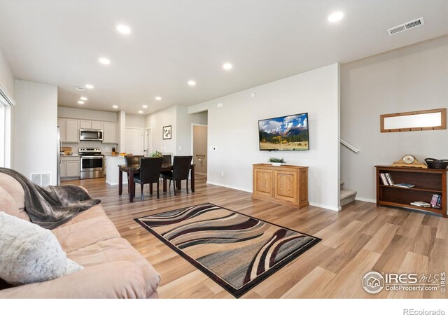 living room featuring light wood-type flooring