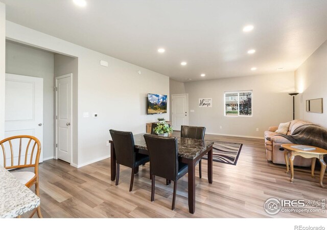 dining room featuring light hardwood / wood-style flooring