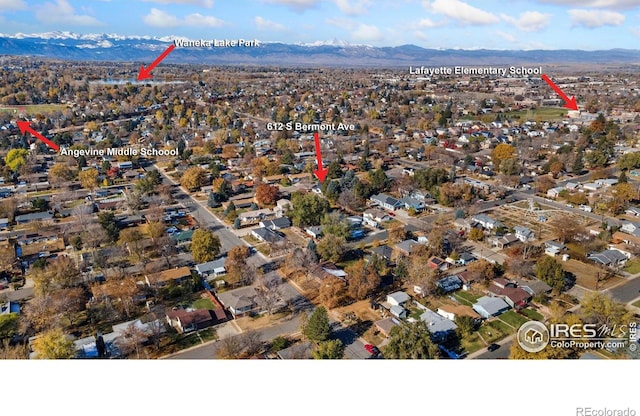 drone / aerial view featuring a mountain view