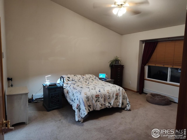 bedroom featuring carpet flooring, ceiling fan, and vaulted ceiling