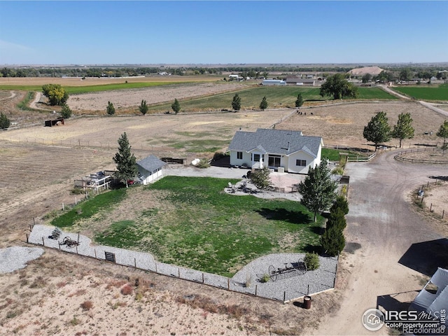 birds eye view of property featuring a rural view