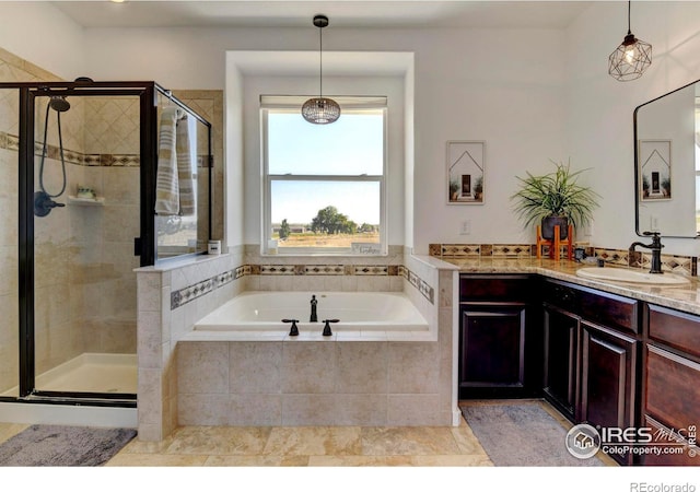 bathroom with separate shower and tub, vanity, and tile patterned floors