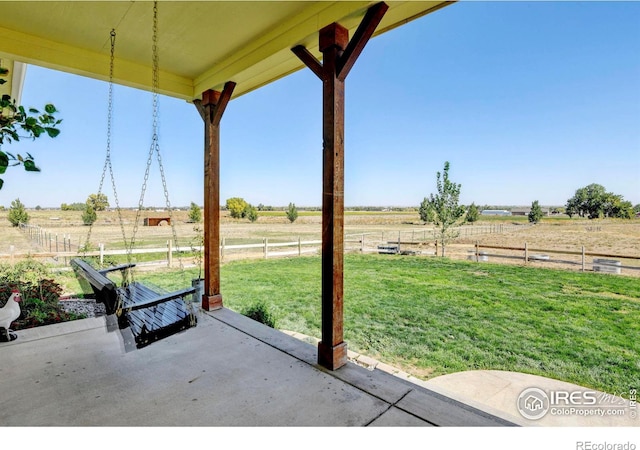 view of patio / terrace featuring a rural view