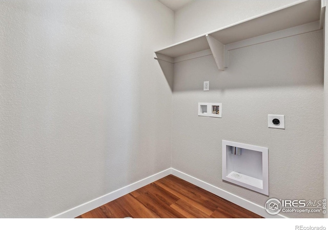 laundry area featuring hardwood / wood-style flooring, electric dryer hookup, and washer hookup