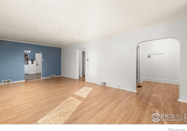 empty room featuring hardwood / wood-style floors