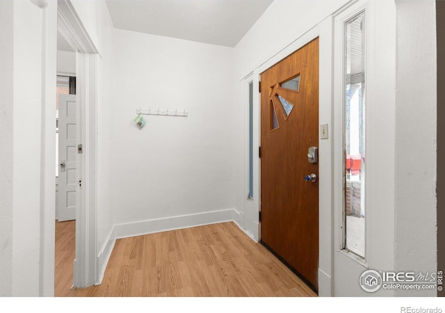 entryway with light wood-type flooring