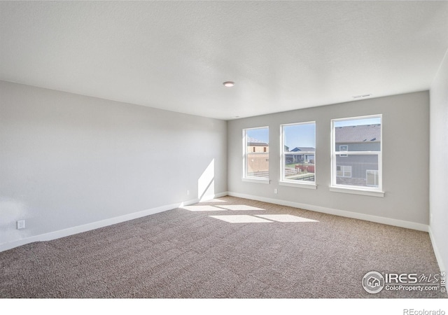 1815 Chaffee Crest Dr, Berthoud, CO 80513 - carpeted empty room featuring a textured ceiling
