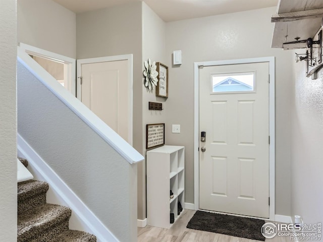 foyer entrance featuring light wood-type flooring