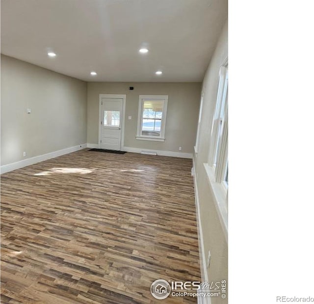 interior space with dark wood-type flooring