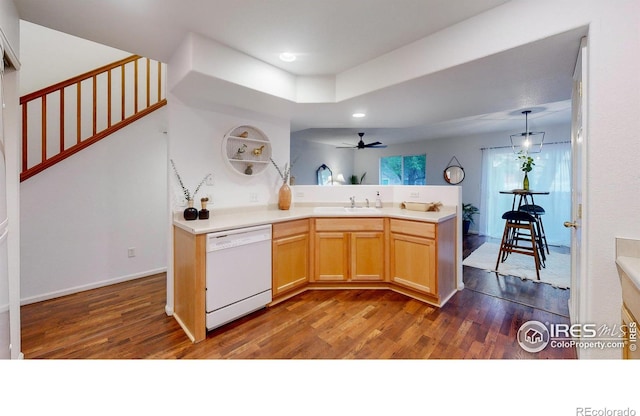 kitchen featuring dark wood-type flooring, white dishwasher, sink, ceiling fan, and light brown cabinetry