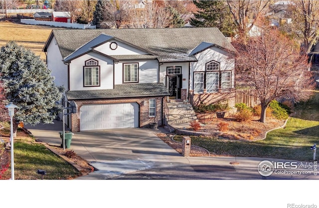 view of front of property featuring a garage