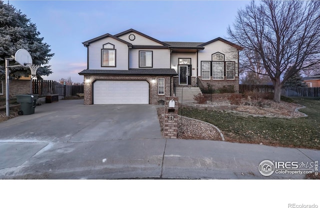 view of front of property featuring a garage