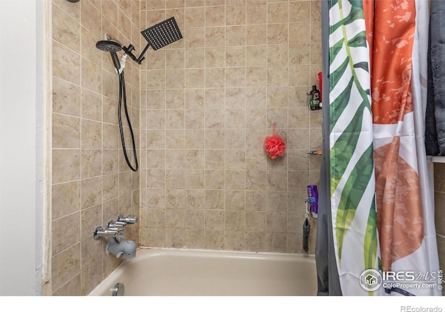 bathroom with shower / bath combo