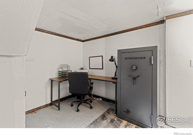 home office featuring a textured ceiling