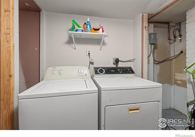 laundry room featuring washing machine and dryer