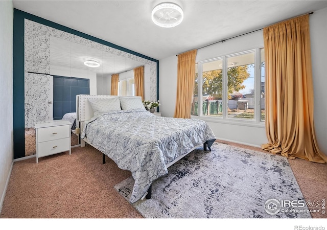 bedroom featuring carpet