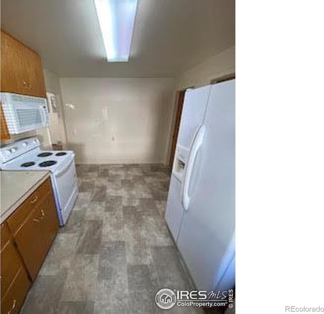 kitchen featuring white appliances