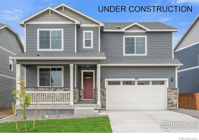 craftsman house with a porch and a garage