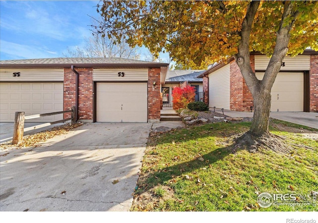 ranch-style house featuring a garage